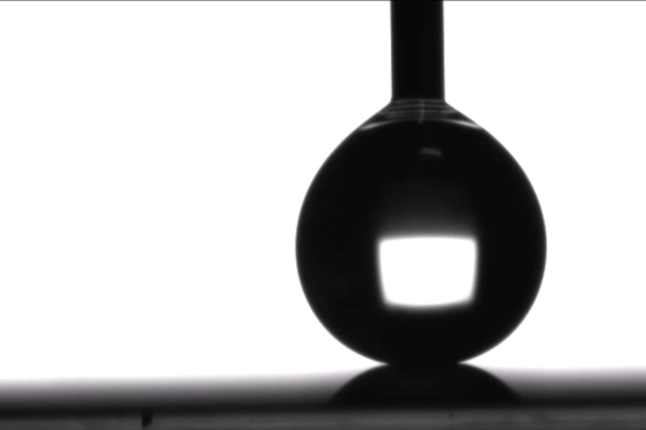image of water droplet on superhydrophobic surface 